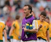 26 August 2012; Former Meath footballer Anthony Moyles in his role as water carrier. Electric Ireland GAA Football All-Ireland Minor Championship Semi-Final, Meath v Mayo, Croke Park, Dublin. Picture credit: Dáire Brennan / SPORTSFILE