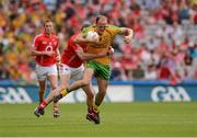 26 August 2012; Colm McFadden, Donegal, is tackled by Cork captain Graham Canty. GAA Football All-Ireland Senior Championship Semi-Final, Cork v Donegal, Croke Park, Dublin. Picture credit: Ray McManus / SPORTSFILE