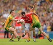 26 August 2012; Donncha O'Connor, Cork, in action against Leo McLoone, left, and David Walsh, Donegal. GAA Football All-Ireland Senior Championship Semi-Final, Cork v Donegal, Croke Park, Dublin. Picture credit: Ray McManus / SPORTSFILE