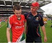 26 August 2012; Kevin Lynch, Mayo, consoled by Michael Ruane, Mayo selector, after the game. Electric Ireland GAA Football All-Ireland Minor Championship Semi-Final, Meath v Mayo, Croke Park, Dublin. Picture credit: Oliver McVeigh / SPORTSFILE