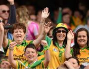 26 August 2012; Donegal supporters Mary, Louise and Amy McGill cheer on their team. GAA Football All-Ireland Senior Championship Semi-Final, Cork v Donegal, Croke Park, Dublin. Picture credit: Ray McManus / SPORTSFILE