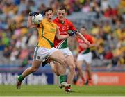 26 August 2012; James McEntee, Meath, in action against Diarmuid O'Connor, Mayo. Electric Ireland GAA Football All-Ireland Minor Championship Semi-Final, Meath v Mayo, Croke Park, Dublin. Picture credit: Ray McManus / SPORTSFILE