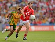 26 August 2012; Ciarán Sheehan, Cork, races clear of Donegal's Karl Lacey. GAA Football All-Ireland Senior Championship Semi-Final, Cork v Donegal, Croke Park, Dublin. Picture credit: Ray McManus / SPORTSFILE