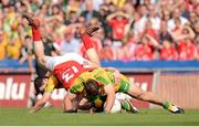 26 August 2012; Colm O'Neill, Cork, in action against Mark McHugh and Neil McGee, Donegal. GAA Football All-Ireland Senior Championship Semi-Final, Cork v Donegal, Croke Park, Dublin. Picture credit: Oliver McVeigh / SPORTSFILE