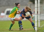 11 August 2012; Aoife O'Neil, Clare, in action against Caitriona Keoghan, Meath. TG4 All-Ireland Ladies Football Senior Championship Qualifier Round 2, Clare v Meath, St. Brendan’s Park, Birr, Co. Offaly. Picture credit: Barry Cregg / SPORTSFILE
