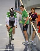 30 August 2012; Ireland's tandem pairing James Brown, from Stonehouse, England, behind, and pilot Damien Shaw, from Mullingar, Co. Westmeath, are greeted by coach Brian Nugent, from Cookstown, Dublin, after competeing in the qualifiying round of the men's individual B pursuit. The tandem pair finished in a time of 4:25.557 qualifying them for this afternoon's Bronze medal ride off. London 2012 Paralympic Games, Cycling, Velodrome, Olympic Park, Stratford, London, England. Picture credit: Brian Lawless / SPORTSFILE