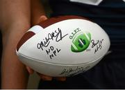 30 August 2012; A commemorative football signed by former Dublin footballer Brian Mullins and NFL legend Mike McCoy during the pep rally ahead of the Global Ireland Football Tournament 2012. Global Ireland Football Tournament 2012, Pep Rally, Trinity College, Dublin. Picture credit: Pat Murphy / SPORTSFILE