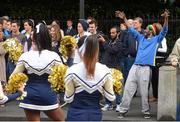 30 August 2012; A member of the public dances with the Notre Dame High School cheerleaders during the parade ahead of the Global Ireland Football Tournament 2012. Global Ireland Football Tournament 2012, Parade, Dawson Street, Dublin. Picture credit: Pat Murphy / SPORTSFILE