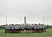 31 August 2012; A general view of Navy players looking on as team quarterback Trey Miller practices a throw during a practice session ahead of the 2012 Emerald Isle Classic match against Notre Dame on Saturday. Lansdowne Rugby Club, Lansdowne Road, Dublin. Picture credit: Barry Cregg / SPORTSFILE
