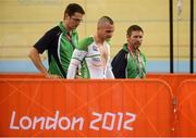 31 August 2012; Ireland's Colin Lynch, from Macclesfield, England, with coach Brian Nugent, from Cookstown, Dublin, left, and team manager Denis Toomey, from Mitchelstown, Cork, after the men's individual C2 pursuit bronze medal final. London 2012 Paralympic Games, Cycling, Velodrome, Olympic Park, Stratford, London, England. Picture credit: Brian Lawless / SPORTSFILE