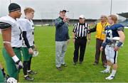 31 August 2012; Former Dublin footballer and UCD Director of Sport Brian Mullins tosses the coin in front of the team captains and match officials before the game. Global Ireland Football Tournament 2012, Kent School, Connecticut, v National School of American Football, Ireland/UK, Parnell Park, Dublin. Picture credit: Brendan Moran / SPORTSFILE