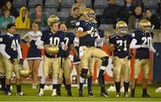 31 August 2012; Notre Dame High School quarterback Kelly Hilinski, 3rd from right, and his team-mates celebrate late in the game before victory over Hamilton HS. Global Ireland Football Tournament 2012, Notre Dame High School, California v Hamilton High School, Arizona. Parnell Park, Dublin. Picture credit: Brendan Moran / SPORTSFILE