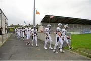 31 August 2012; The Hamilton High School team make their way out for their warm-up before the game. Global Ireland Football Tournament 2012, Notre Dame High School, California v Hamilton High School, Arizona, Parnell Park, Dublin. Picture credit: Brendan Moran / SPORTSFILE