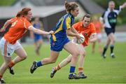 1 September 2012; Michelle Farrell, Longford, in action against Niamh Marley and Sarah Marley, 4, Armagh. TG4 All-Ireland Ladies Football Intermediate Championship Semi-Final, Armagh v Longford, St. Brendan’s Park, Birr, Co. Offaly. Matt Browne / SPORTSFILE