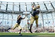 1 September 2012; Tyler Eifert, Notre Dame, catches in the End Zone for a touchdown under pressure from Keegan Wetzel , left, and Parrish Gaines, 2, Navy. NCAA Emerald Isle Classic, Navy v Notre Dame, Aviva Stadium, Lansdowne Road, Dublin. Picture credit: Pat Murphy / SPORTSFILE