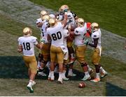 1 September 2012; Notre Dame players celebrate after #4 George Atkinson scored a third quarter touchdown. NCAA Emerald Isle Classic, Notre Dame v Navy, Aviva Stadium, Lansdowne Road, Dublin. Picture credit: Stephen McCarthy / SPORTSFILE