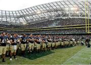 1 September 2012; The Navy players salute the naval flag after the game. NCAA Emerald Isle Classic, Navy v Notre Dame, Aviva Stadium, Lansdowne Road, Dublin. Picture credit: Pat Murphy / SPORTSFILE