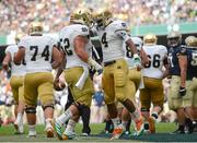 1 September 2012; George Atkinson III, Notre Dame, celebrates with team-mate Braxston Cave, left, after scoring a touchdown. NCAA Emerald Isle Classic, Navy v Notre Dame, Aviva Stadium, Lansdowne Road, Dublin. Picture credit: Pat Murphy / SPORTSFILE