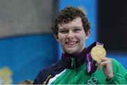 1 September 2012; Ireland's Darragh McDonald, from Gorey, Co. Wexford, celebrates with his gold medal after winning the men's 400m freestyle - S6 final. London 2012 Paralympic Games, Swimming, Aquatics Centre, Olympic Park, Stratford, London, England. Picture credit: Ian MacNicol / SPORTSFILE