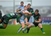 1 September 2012; Daniel Fish, Cardiff Blues, is tackled by Mata Fifita, left, and Eoin Griffin, Connacht. Celtic League, Round 1, Connacht v Cardiff Blues, The Sportsground, College Road, Galway. Picture credit: Barry Cregg / SPORTSFILE