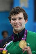 1 September 2012; Ireland's Darragh McDonald, from Gorey, Co. Wexford, celebrates with his gold medal after winning the men's 400m freestyle - S6 final. London 2012 Paralympic Games, Swimming, Aquatics Centre, Olympic Park, Stratford, London, England. Picture credit: Ian MacNicol / SPORTSFILE