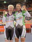 2 September 2012; Ireland's Catherine Walsh, left, from Swords, Dublin, and pilot Francine Meehan, from Killurin, Co. Offaly, celebrate with their silver medal after finishing in second place in the women's individual B pursuit final. London 2012 Paralympic Games, Cycling, Velodrome, Olympic Park, Stratford, London, England. Picture credit: Brian Lawless / SPORTSFILE