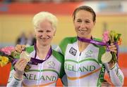2 September 2012; Ireland's Catherine Walsh, left, from Swords, Dublin, and pilot Francine Meehan, from Killurin, Co. Offaly, celebrate with their silver medal after finishing in second place in the women's individual B pursuit final. London 2012 Paralympic Games, Cycling, Velodrome, Olympic Park, Stratford, London, England. Picture credit: Brian Lawless / SPORTSFILE