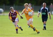 2 September 2012; Mairead Cooper, Antrim, in action against Maeve Quill, Wexford. TG4 All-Ireland Ladies Football Junior Championship Semi-Final, Antrim v Wexford, Clane GAA Club, Co. Kildare. Picture credit: Matt Browne / SPORTSFILE