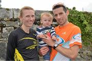 2 September 2012; Maria McCambridge, with her husband Garry Crossan and their son Dylan, aged15 months, after she won the women's race during the Woodie’s DIY Half Marathon Championships of Ireland. Presentation College, Athenry, Co. Galway. Picture credit: Barry Cregg / SPORTSFILE