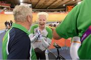 2 September 2012; Ireland's Catherine Walsh, from Swords, Dublin, is congratulated by Gerry Beggs, Paralympic Cycling Coach, left, after winning silver in the women's individual B pursuit final. London 2012 Paralympic Games, Cycling, Velodrome, Olympic Park, Stratford, London, England. Picture credit: Brian Lawless / SPORTSFILE