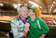 2 September 2012; Ireland's Catherine Walsh, from Swords, Dublin, with her daughter Alison Roode, age 8, celebrate with her silver medal after finishing in second place in the women's individual B pursuit final. London 2012 Paralympic Games, Cycling, Velodrome, Olympic Park, Stratford, London, England. Picture credit: Brian Lawless / SPORTSFILE
