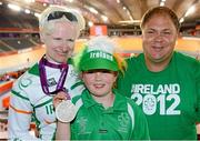 2 September 2012; Ireland's Catherine Walsh, from Swords, Dublin, with her husband Wally Roode and daughter Alison Roode, age 8, celebrate with her silver medal after finishing in second place in the women's individual B pursuit final. London 2012 Paralympic Games, Cycling, Velodrome, Olympic Park, Stratford, London, England. Picture credit: Brian Lawless / SPORTSFILE