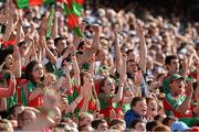2 September 2012; Mayo supporters in the Cusack Stand celebrate an early score. Semi-Final, Dublin v Mayo, Croke Park, Dublin. Picture credit: Ray McManus / SPORTSFILE