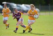 2 September 2012; Mairead Cooper, Antrim, in action against Maeve Quill, Wexford. TG4 All-Ireland Ladies Football Junior Championship Semi-Final, Antrim v Wexford, Clane GAA Club, Co. Kildare. Picture credit: Matt Browne / SPORTSFILE