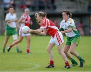 2 September 2012; Patricia Marmion, Louth, in action against Orla Heavey, Offaly. TG4 All-Ireland Ladies Football Junior Championship Semi-Final, Louth v Offaly, Clane GAA Club, Co. Kildare. Picture credit: Matt Browne / SPORTSFILE