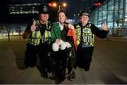 2 September 2012; Ireland's Helen Kearney, from Dunlaven, Co. Wicklow, along with PC Colm Abbott, left, and PC Liz Dales, celebrates with her silver medal for individual championship test - grade 1a. London 2012 Paralympic Games, Equestrian, Olympic Park, Stratford, London, England. Picture credit: Brian Lawless / SPORTSFILE