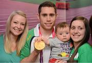 3 September 2012; Team Ireland's Jason Smyth, from Eglinton, Co. Derry, men's 100m - T13 gold medal winner, along with his 6 month old nephew Lewis D'hulst, Elisa Jordan, fiance, left, and his sister Leeza D'hulst at the team lodge. London 2012 Paralympic Games, Team Lodge, Stratford, London, England. Picture credit: Brian Lawless / SPORTSFILE