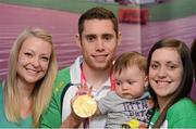 3 September 2012; Team Ireland's Jason Smyth, from Eglinton, Co. Derry, men's 100m - T13 gold medal winner, along with his 6 month old nephew Lewis D'hulst, Elisa Jordan, fiance, left, and his sister Leeza D'hulst at the team lodge. London 2012 Paralympic Games, Team Lodge, Stratford, London, England. Picture credit: Brian Lawless / SPORTSFILE