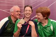 3 September 2012; Team Ireland's Helen Kearney, from Dunlaven, Co. Wicklow, individual championship test - silver grade Ia winner, with her father Michael and mother Mary at the team lodge. London 2012 Paralympic Games, Team Lodge, Stratford, London, England. Picture credit: Brian Lawless / SPORTSFILE