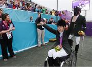4 September 2012; Ireland's Helen Kearney, from Dunlaven, Co. Wicklow, celebrates with her bronze medal in the equestrian team championship. London 2012 Paralympic Games, Equestrian, Greenwich Park, Greenwich, London, England. Picture credit: Brian Lawless / SPORTSFILE