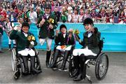 4 September 2012; Ireland's equestrian team, from left, Eilish Byrne, from Dundalk, Co. Louth, James Dwyer, from Mooncoin, Co. Kilkenny, Geraldine Savage, from Dublin, and Helen Kearney, from Dunlaven, Co. Wicklow, celebrate with their bronze medals in the equestrian team championship. London 2012 Paralympic Games, Equestrian, Greenwich Park, Greenwich, London, England. Picture credit: Brian Lawless / SPORTSFILE
