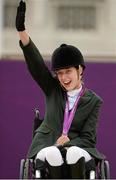 4 September 2012; Ireland's Helen Kearney, from Dunlaven, Co. Wicklow, celebrates after winning a bronze medal in the dressage individual freestyle test - Grade Ia. London 2012 Paralympic Games, Equestrian, Greenwich Park, Greenwich, London, England. Picture credit: Brian Lawless / SPORTSFILE