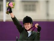 4 September 2012; Ireland's Helen Kearney, from Dunlaven, Co. Wicklow, celebrates after winning a bronze medal in the dressage individual freestyle test - Grade Ia. London 2012 Paralympic Games, Equestrian, Greenwich Park, Greenwich, London, England. Picture credit: Brian Lawless / SPORTSFILE