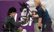 4 September 2012; Ireland's Helen Kearney, from Dunlaven, Co. Wicklow, pats her horse Mister Cool after winning abronze medal in the dressage individual freestyle test - Grade Ia. London 2012 Paralympic Games, Equestrian, Greenwich Park, Greenwich, London, England. Picture credit: Brian Lawless / SPORTSFILE