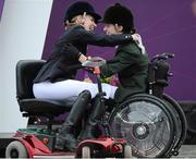 4 September 2012; Ireland's Helen Kearney, from Dunlaven, Co. Wicklow, right, who won a bronze medal in the dressage individual freestyle test - Grade Ia, embraces the winner Sophie Christiansen, Great Britain. London 2012 Paralympic Games, Equestrian, Greenwich Park, Greenwich, London, England. Picture credit: Brian Lawless / SPORTSFILE
