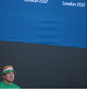6 September 2012; An Ireland supporter watches Ireland's Rena McCarron Rooney, from Buncrana, Co. Donegal, in action during her women's team - classes 1-3 quarter-final match against Pamela Pezzutto, Italy. London 2012 Paralympic Games, Table Tennis, North Arena 1, ExCeL Arena, Royal Victoria Dock, London, England. Picture credit: Brian Lawless / SPORTSFILE