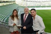 6 September 2012; Olympic Gold medal winner, Katie Taylor, and former WBA Super Bantamweight World Champion, Bernard Dunne, with broadcaster Jimmy Magee at the launch of his autobiography &quot;Memory Man&quot;. Havelock Suite, Aviva Stadium, Lansdowne Road, Dublin. Picture credit: Ray McManus / SPORTSFILE