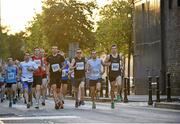 6 September 2012; Race leaders, from left, Mark Lacey, Airbus Jets, Mark Kenneally, Garda Athletic Club, 611, Dermot McDermott, Irish Runner, 1707, and Ray Hynes, Davy Team 1, 400, during the early stages of the Grant Thornton Corporate 5k Team Challenge. Docklands, Dublin. Picture credit: Barry Cregg / SPORTSFILE