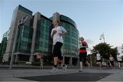 6 September 2012; Athletes make their way past the IFSC House while competing in the Grant Thornton Corporate 5k Team Challenge. Docklands, Dublin. Picture credit: Pat Murphy / SPORTSFILE