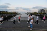 6 September 2012; Athletes cross the Matt Talbot Bridge while competing in the Grant Thornton Corporate 5k Team Challenge. Docklands, Dublin. Picture credit: Pat Murphy / SPORTSFILE